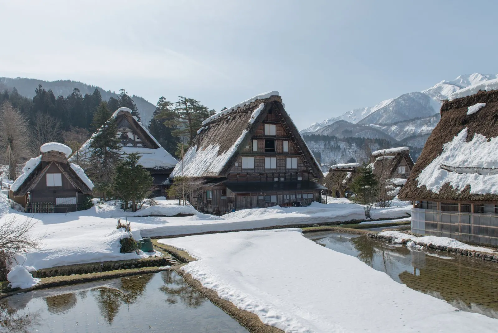 Shirakawa-go in winter, when the steep roofs earn their shape